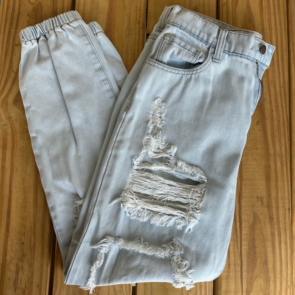 Vibrant M.i.u Light Wash Distressed Jeans